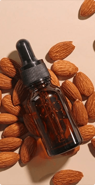 Bottle of canola oil with almonds